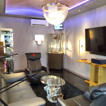 Luxury Garage Lounge With Engine Table and Ferrari Chair - Dan