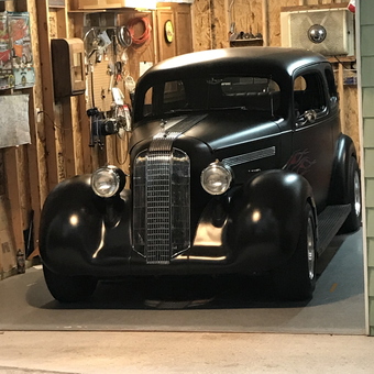 Classic Black Hot Rod and Organized Garage Tools - George