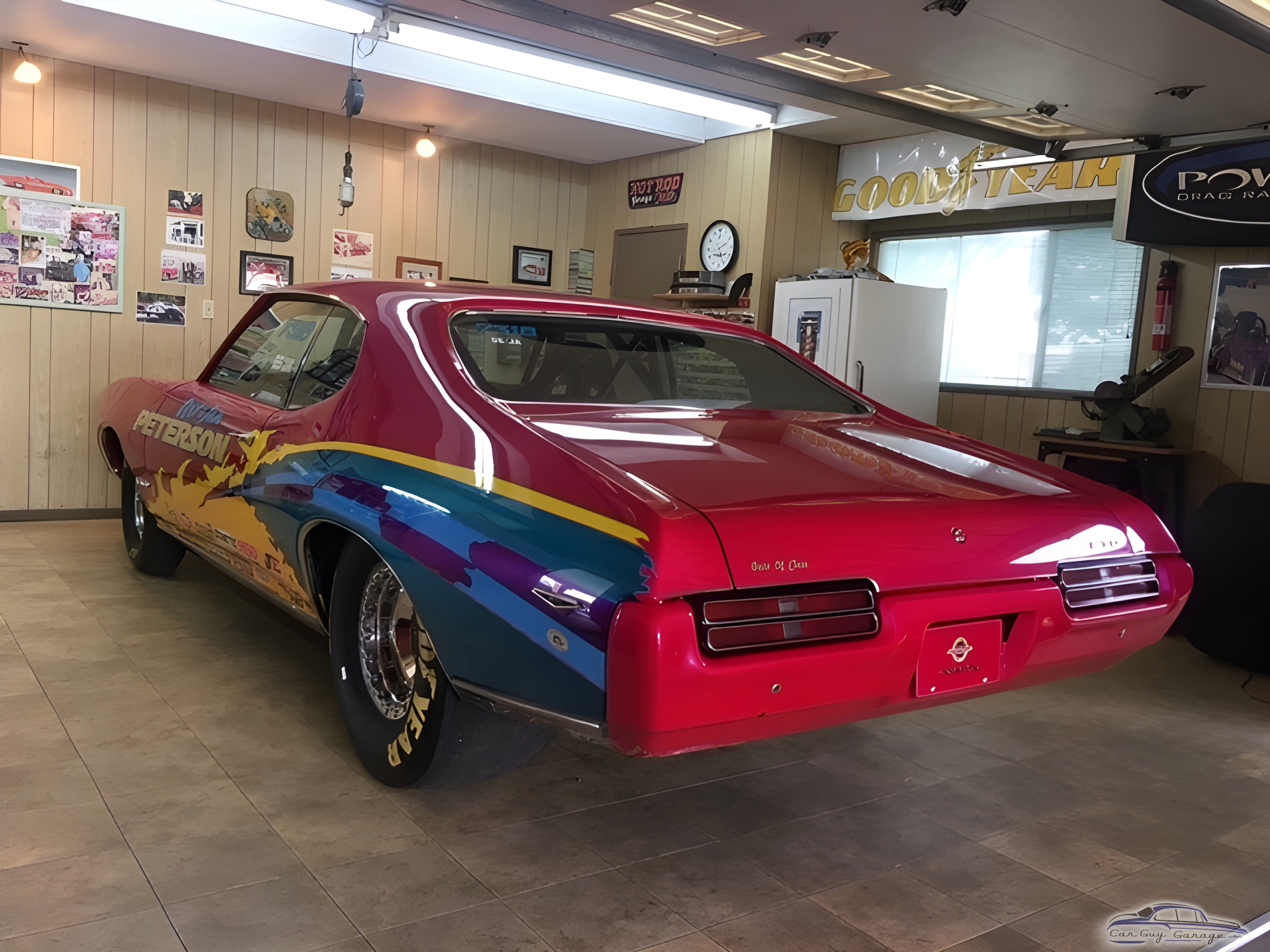 Colorful classic muscle car in custom garage - Art from Rialto, CA
