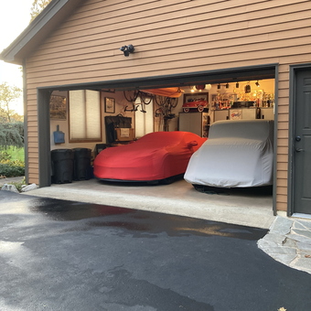 Organized garage with car covers, cabinets, and wall storage - Bruce from East Brunswick, NJ