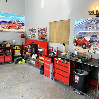 Red Tool Cabinets and Car Wall Art in Organized Garage - Gootjr from Monument, CO