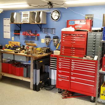 Organized garage with tool chests, workbench, and wall storage - Lou from Hartland, WI