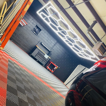 Modern garage with LED lights and modular flooring - Red Level Car Wash from new castle, DE
