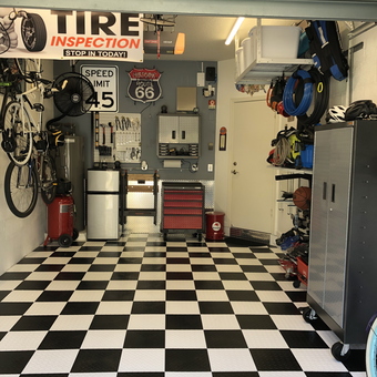 Organized garage with checkered flooring and wall storage - Joseph from Boynton Beach, FL