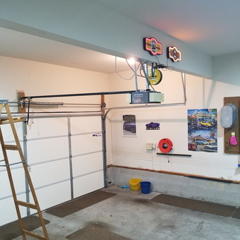 Organized garage with neon signs and wall storage - Don from Chester, VA