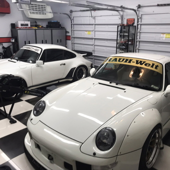 White Porsche Garage with Cabinets and Checkered Floor - Ralph from Miami, FL