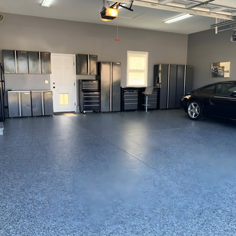Modern garage with black cabinets and epoxy floor - ken from Bettendorf, IA