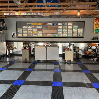 Organized garage with storage cabinets and decor - Andy from Manassas, VA
