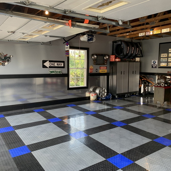 Custom garage with tile flooring, cabinets, decor - Andy from Manassas, VA