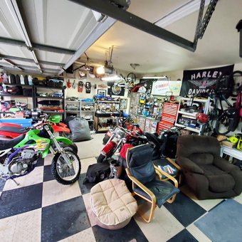 Organized Garage with Motorcycles, Tool Storage, and Wall Racks - Flawless Finish Mobile Detailing from San Diego, CA