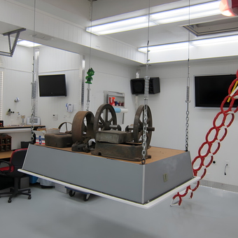 Modern garage with lift platform, TVs, and workspace - Wes from Richardson, TX