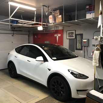 Organized Tesla Garage with Overhead Storage Racks - Dave from Las Vegas, NV