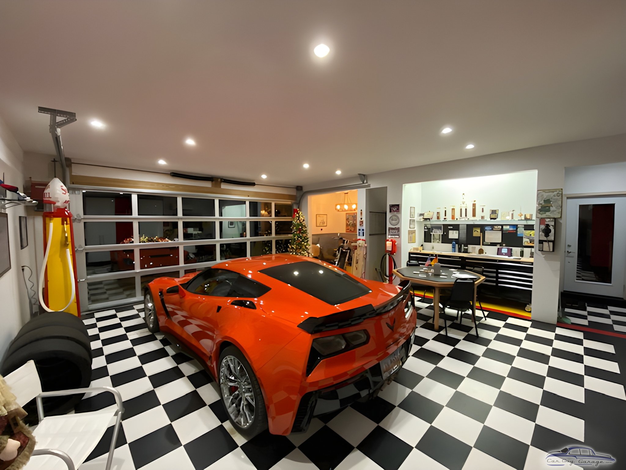 Modern garage with orange sports car and checkered floor - Ed from Summerville, SC