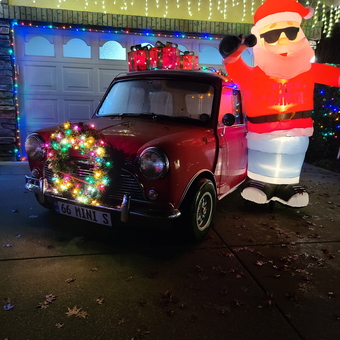 Classic Mini Decorated With Holiday Lights And Santa - Jimini from Danville, CA