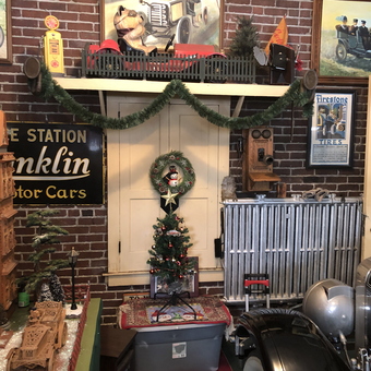 Vintage Garage Decor with Classic Car Models and Signs - Dave