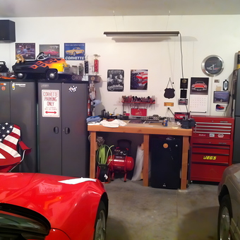 Organized garage with cabinets, tool chest, and workbench - Dave from Garden City, KS