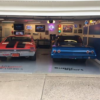 Classic Car Garage with Neon Signs and Storage Cabinets - Mark