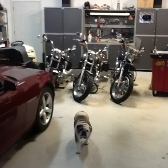 Garage with Motorcycles, Storage Cabinets, and Car - Mac's Garage from Thompson, CT