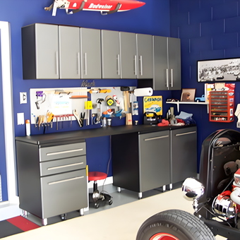 Modern garage with cabinets, workbench, and pegboard - Greg from Winter Garden, FL