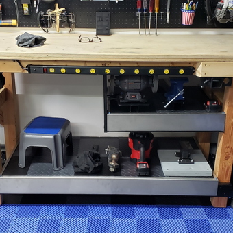Organized garage workbench with tools and Husky air compressor - Joe from Summerville, SC