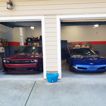 Organized two-car garage with sports cars and storage - Perry from Wake Forest, NC