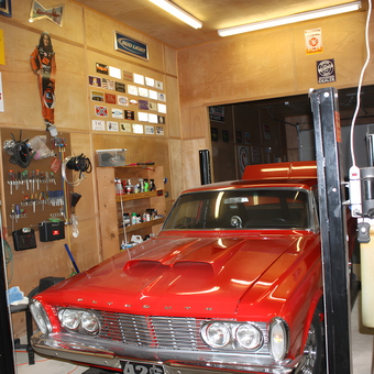 Classic car on lift with organized tools and decor - James from Opelousas, LA