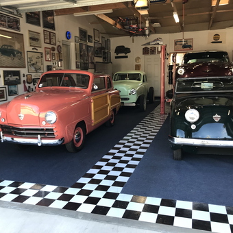 Classic Cars, Wall Art, and Car Lift in Gary's Garage from Southern California
