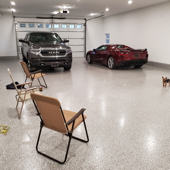 Spacious epoxy garage with chairs, truck, sports car - Tim from Norway, IA