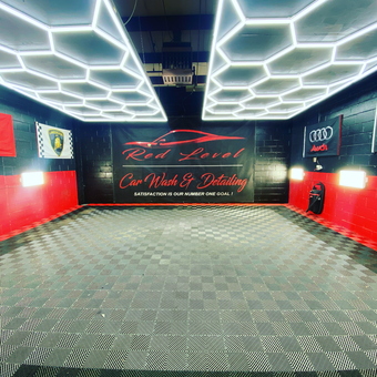 Modern garage with LED lights and tile flooring - Red Level Car Wash from New Castle, DE