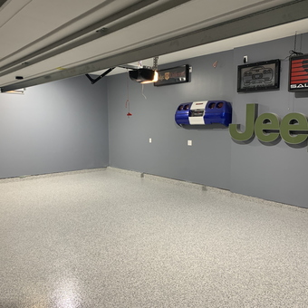 Clean epoxy garage floor with Jeep wall decor - Trevor from Amelia, OH
