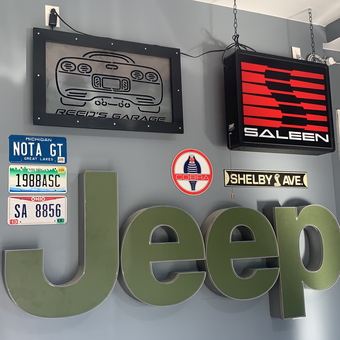 Garage Wall Decor with Jeep Sign and Car Memorabilia - Trevor from Amelia, OH
