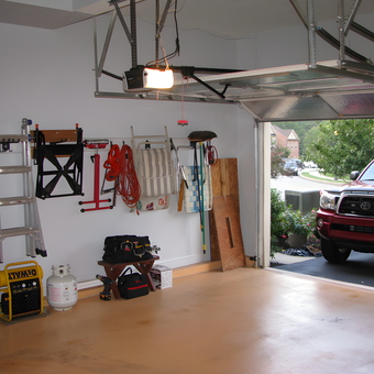 Organized garage with storage racks, tools, and cabinets - Pete's Garage from Garnet Valley, PA