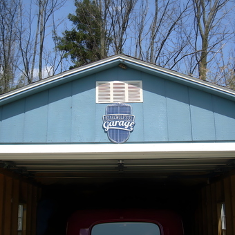 Blue garage with personalized garage sign - Richard from Bloomfield, NY