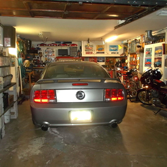 Organized Garage with Mustang, Motorcycle, and Wall Storage - Larry