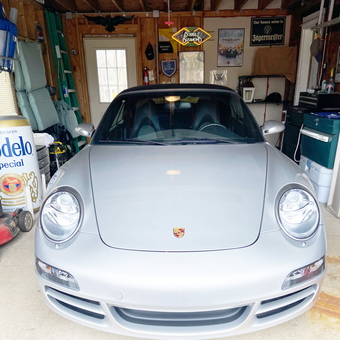 Organized garage with Porsche and decor signs - Fether from Milwaukee, WI
