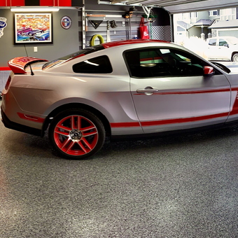 Organized garage with Mustang, tool chests, and wall storage - Jim from Okotoks Canada