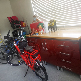 Red garage cabinets and bicycles with countertop - Brenda from FORT MYERS, FL