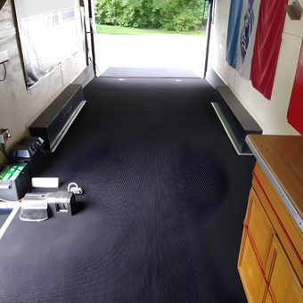 Organized trailer garage with cabinets and flooring - Brian from Painesville, OH