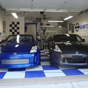 Organized garage with two Nissan sports cars and tool storage - Gary from Waldorf, MD