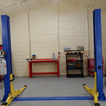 Two post car lift and tool storage in garage - Sharp from Temple, TX