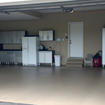 Modern garage with cabinets, motorcycle, and storage - Tom from Waconia, MN
