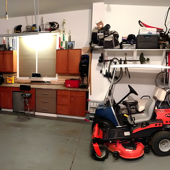 Organized garage with tool chest, cabinets, and mower - Rick from Warren, OH