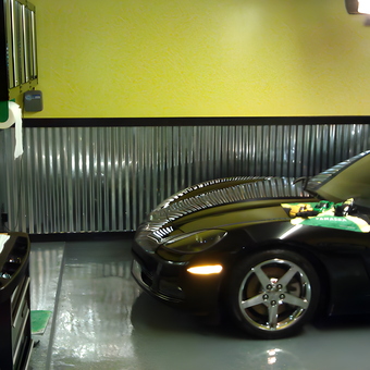 Organized Garage With Corvette, Cabinets, and Metal Wainscoting - Hugh
