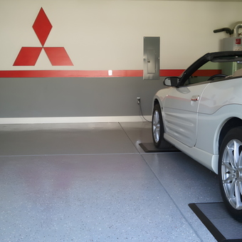 Clean epoxy garage floor with Mitsubishi logo - Patrick from Concord, NC