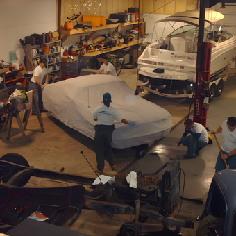 Organized garage with car cover, boat, storage shelves - Dennis from Sturgeon Bay, WI