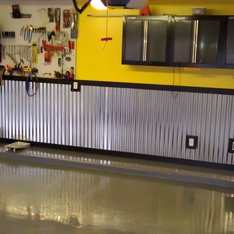 Organized Garage With Cabinets, Pegboard, and Metal Wainscoting - Hugh