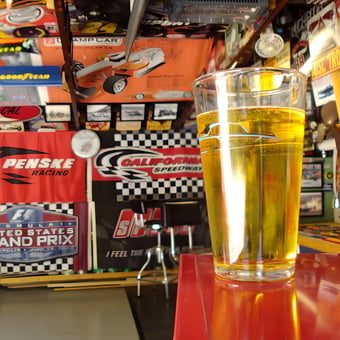 Racing Decor Garage with Bar Stools and Wall Flags - Mark from Sierra Madre, CA