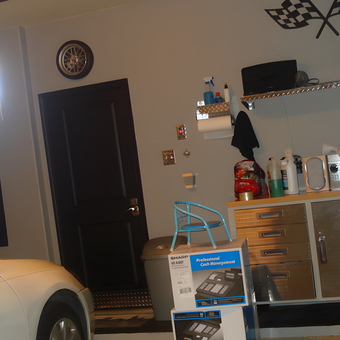 Organized Garage with Metal Cabinets and Wall Shelf - New York Garage from Dallas, TX