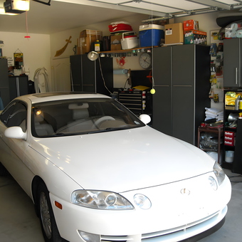 Organized garage with cabinets, car, and storage - Harold from Prescott, AZ