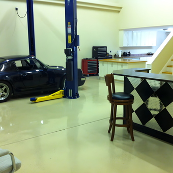 Garage with Car Lift, Bar Stools, Tool Chest, and Cabinets - Paul from Frisco, NC